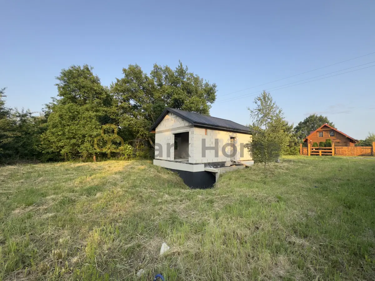 Działka z rozpoczętą budową domku letniskowego