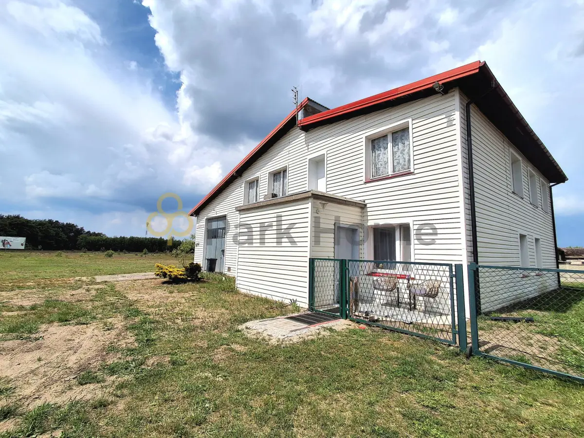 Dom z warsztatem samochodowym i działką 1,42ha