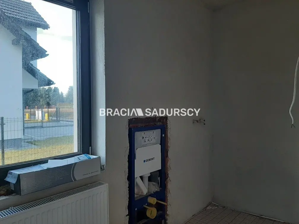 Nowoczesne domy w zabudowie bliźniaczej z garażem