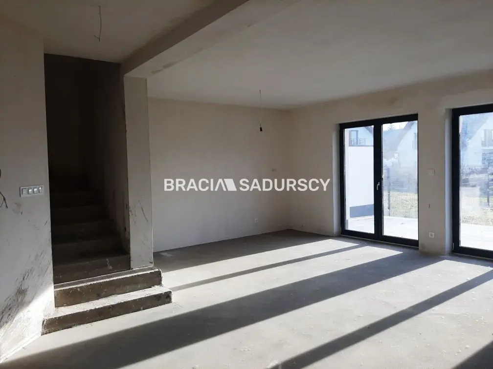 Nowoczesne domy w zabudowie bliźniaczej z garażem