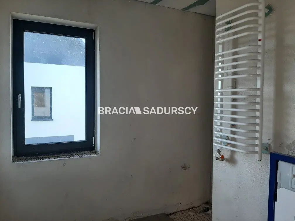 Nowoczesne domy w zabudowie bliźniaczej z garażem