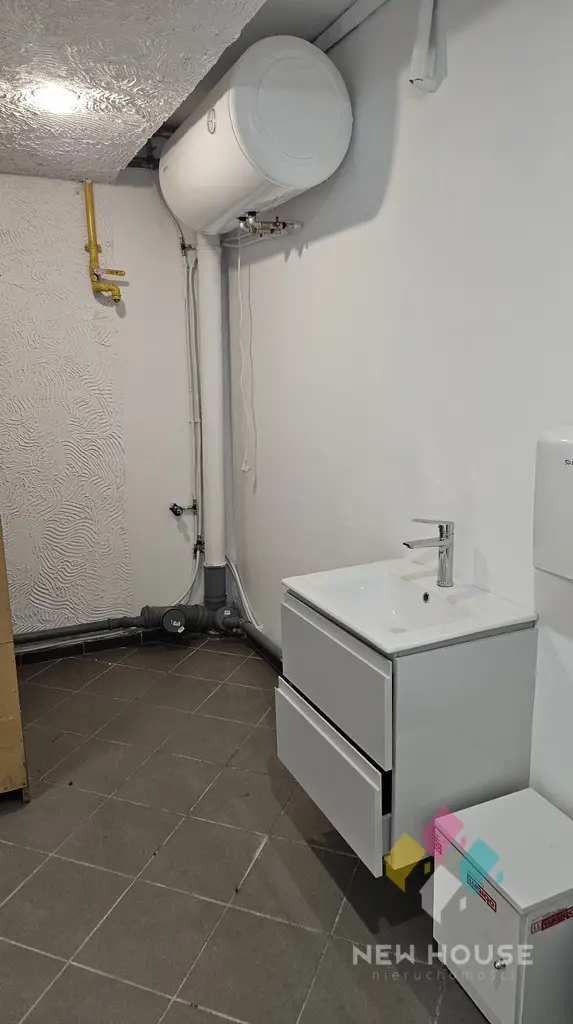 Lokal handlowo-usługowy w D.H Manhattan