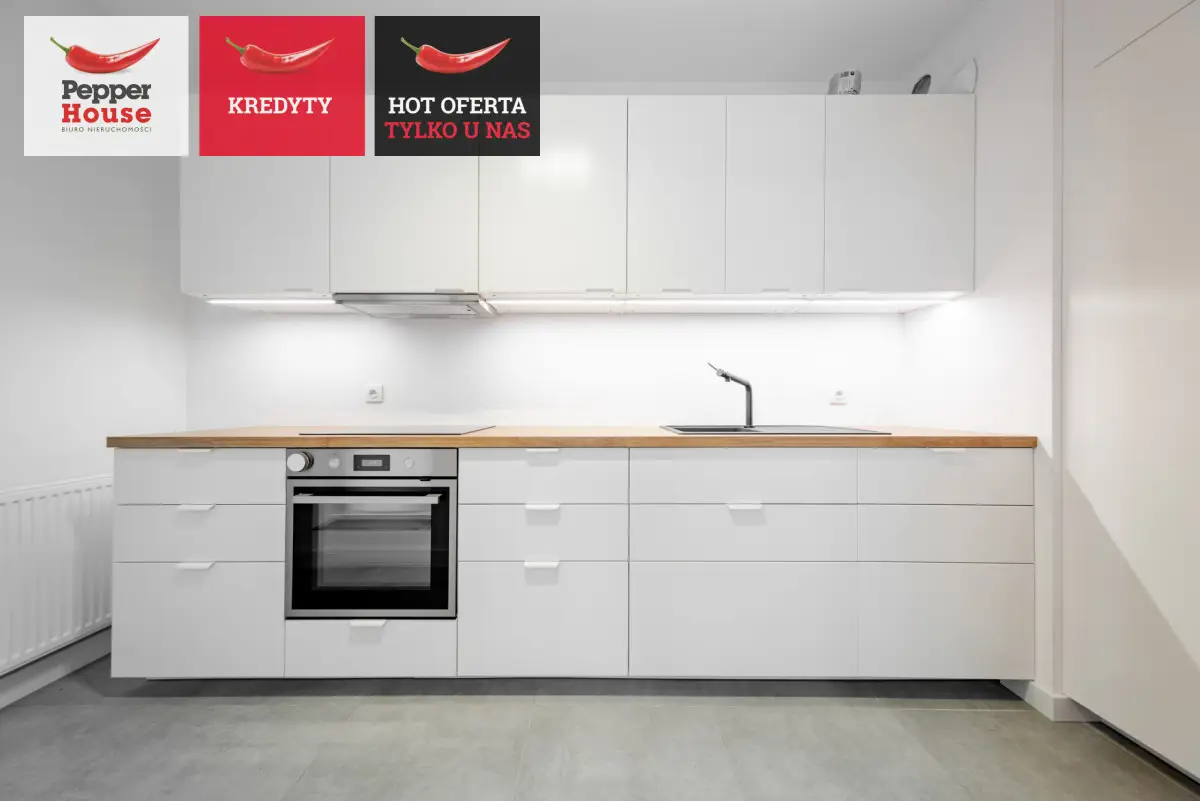 Kawalerka z oddzielną kuchnią ogródkiem na patio